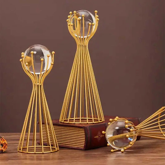 Golden Crystal Ball with Geometric Iron Stand