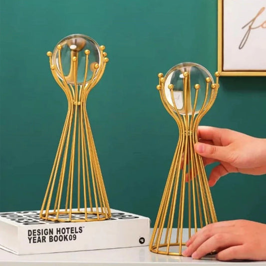 Golden Crystal Ball with Geometric Iron Stand